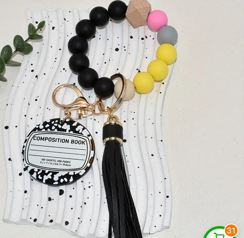 Composition wristlet