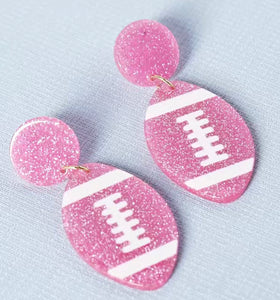 Pink football earrings