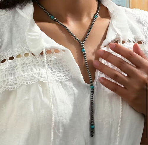 Navajo sweater pearls