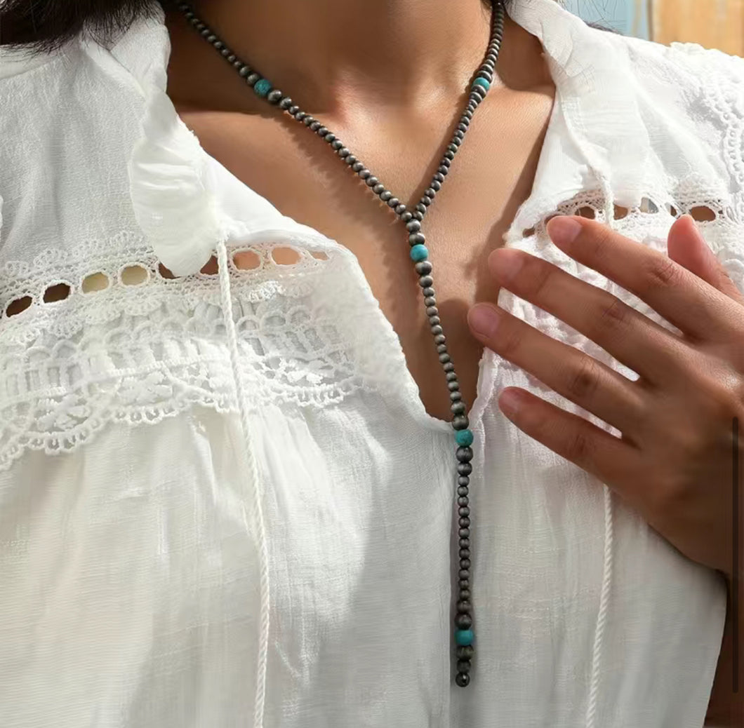 Navajo sweater pearls