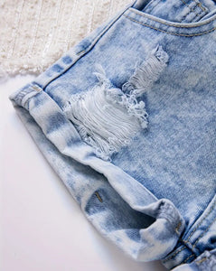 Rolled hem distressed jean shorts