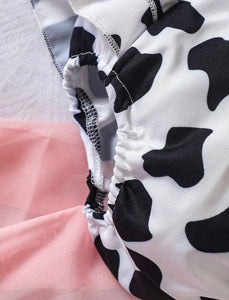 Pink ruffled cow onesie