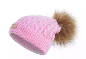 Knitted beanies with pom